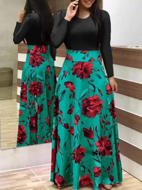 A woman in a long green and red floral skirt.