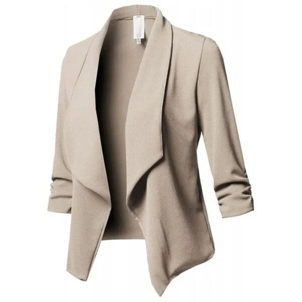 A beige jacket with three quarter sleeves and a draped front.