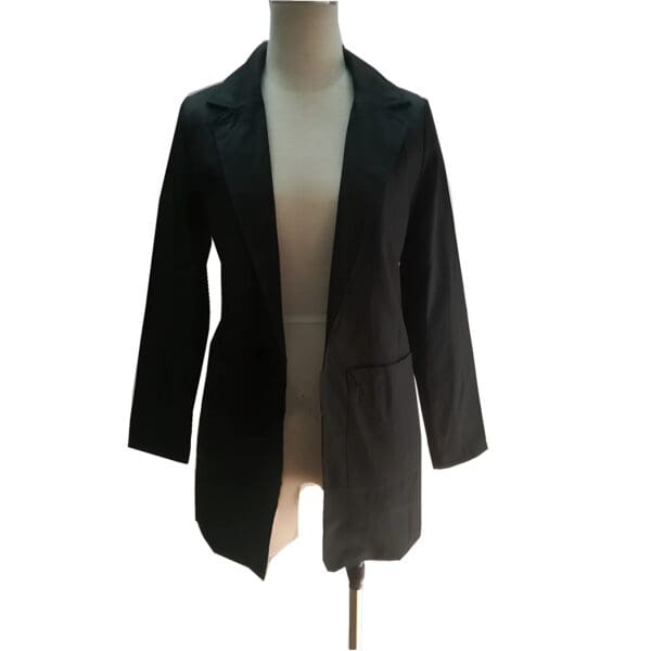 A black jacket is on display with a white shirt.