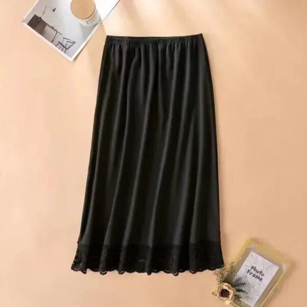 A black skirt with a ruffle on the bottom