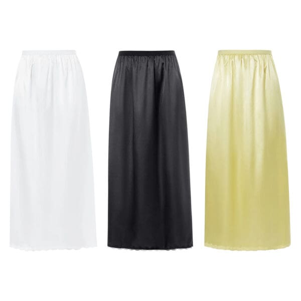 Three skirts in different colors are shown.