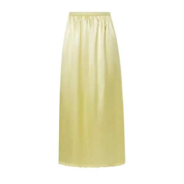 A yellow skirt is shown with no pattern.