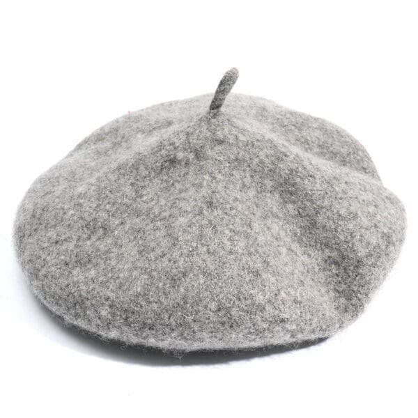 A gray hat is on the ground.