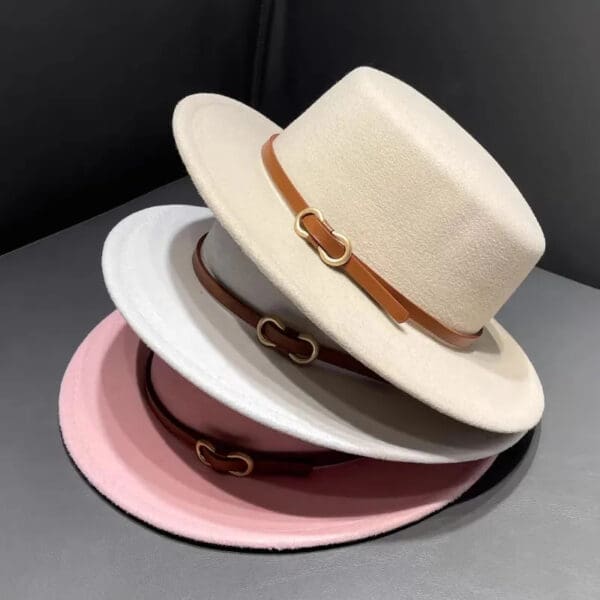 Three hats stacked on top of each other.