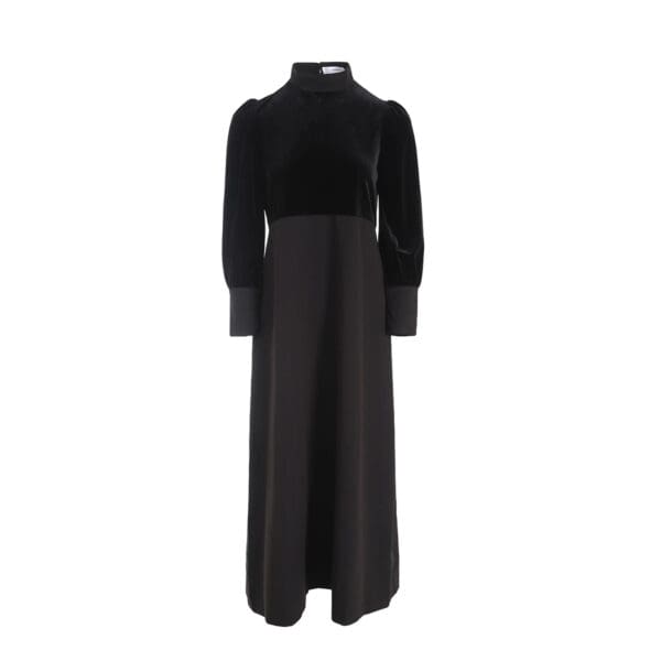 A black dress with long sleeves and a high neck.